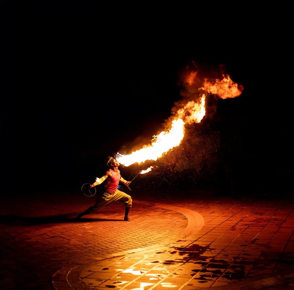 A man showcases his talent in a fire show